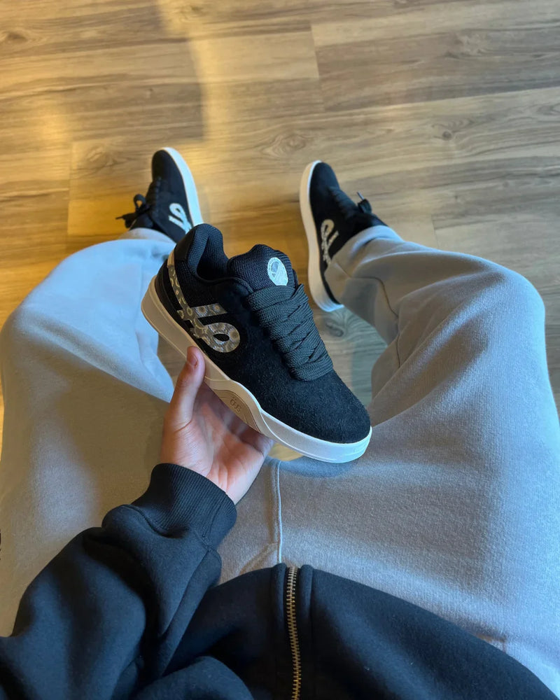 Öus Imigrante Série X Preto Movimento Essencial